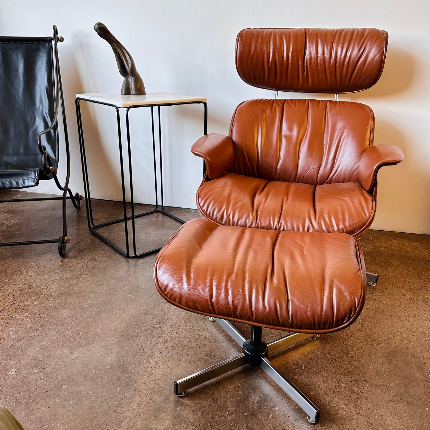 VINTAGE PLYCRAFT COGNAC AND WALNUT LOUNGE CHAIR AND OTTOMAN