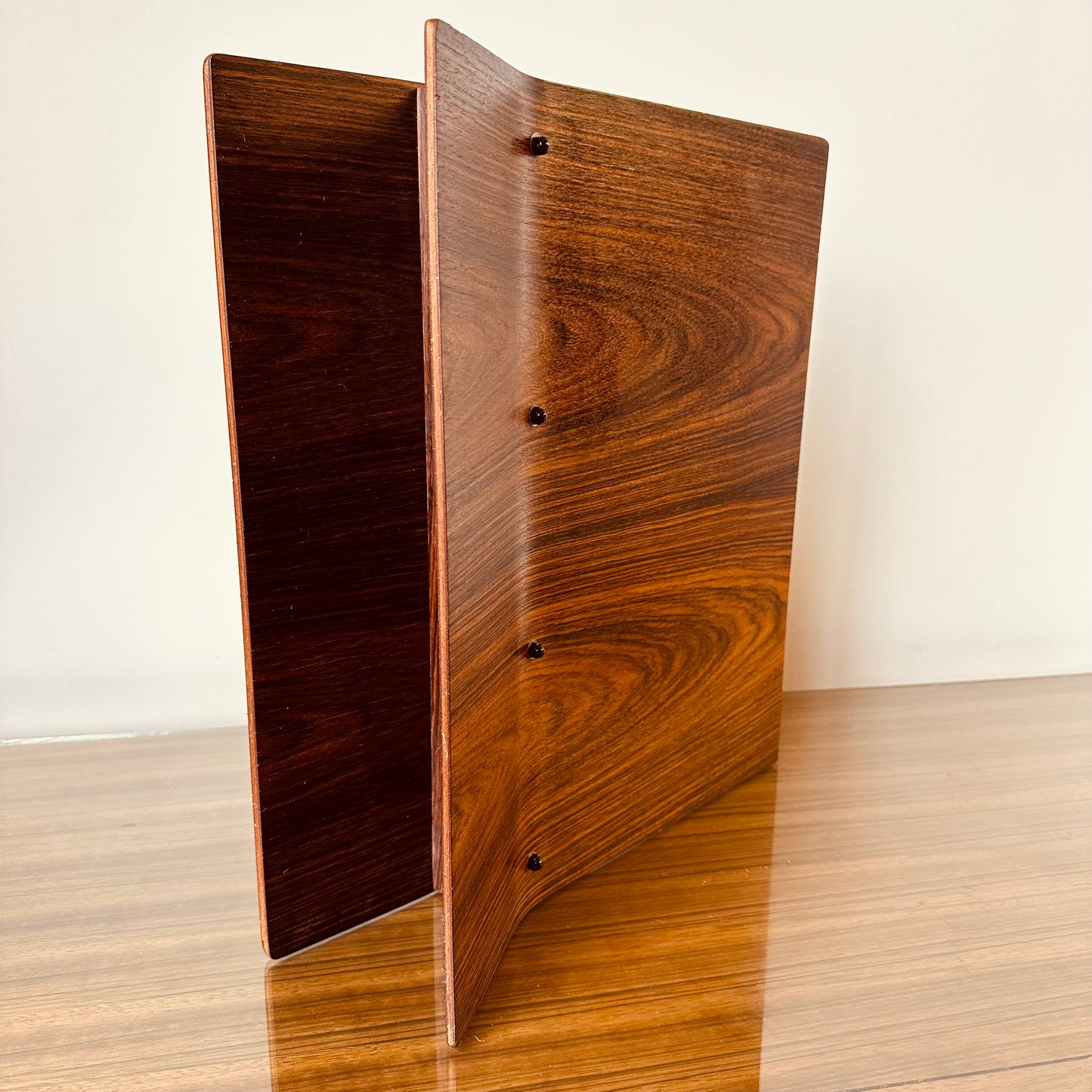 ROSEWOOD MAGAZINE RACK IN THE MANNER OF ALVAR AALTO