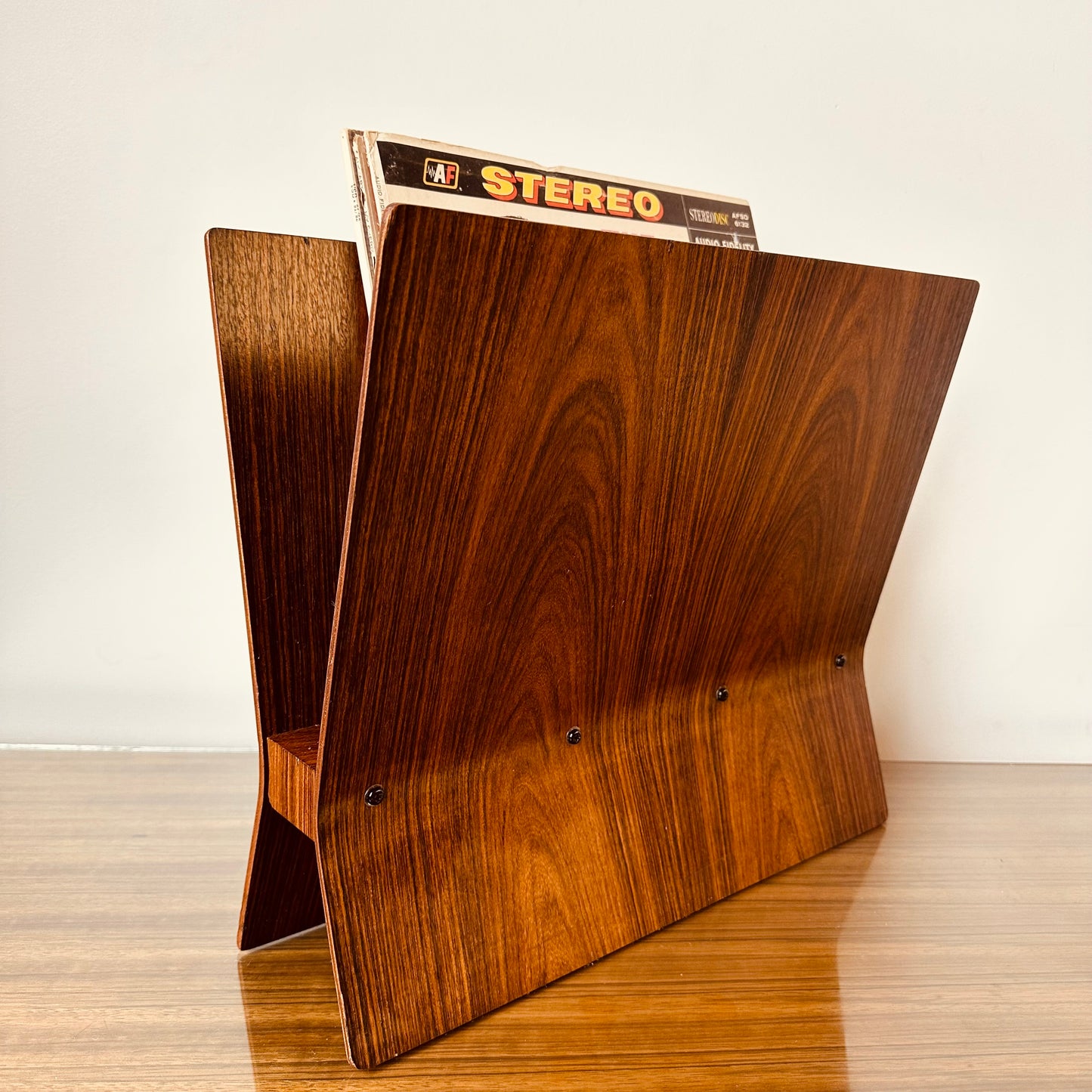 ROSEWOOD MAGAZINE RACK IN THE MANNER OF ALVAR AALTO