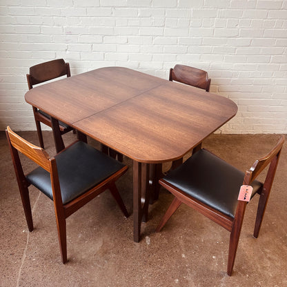 WALNUT DINING TABLE WITH SCULPTURAL BASE
