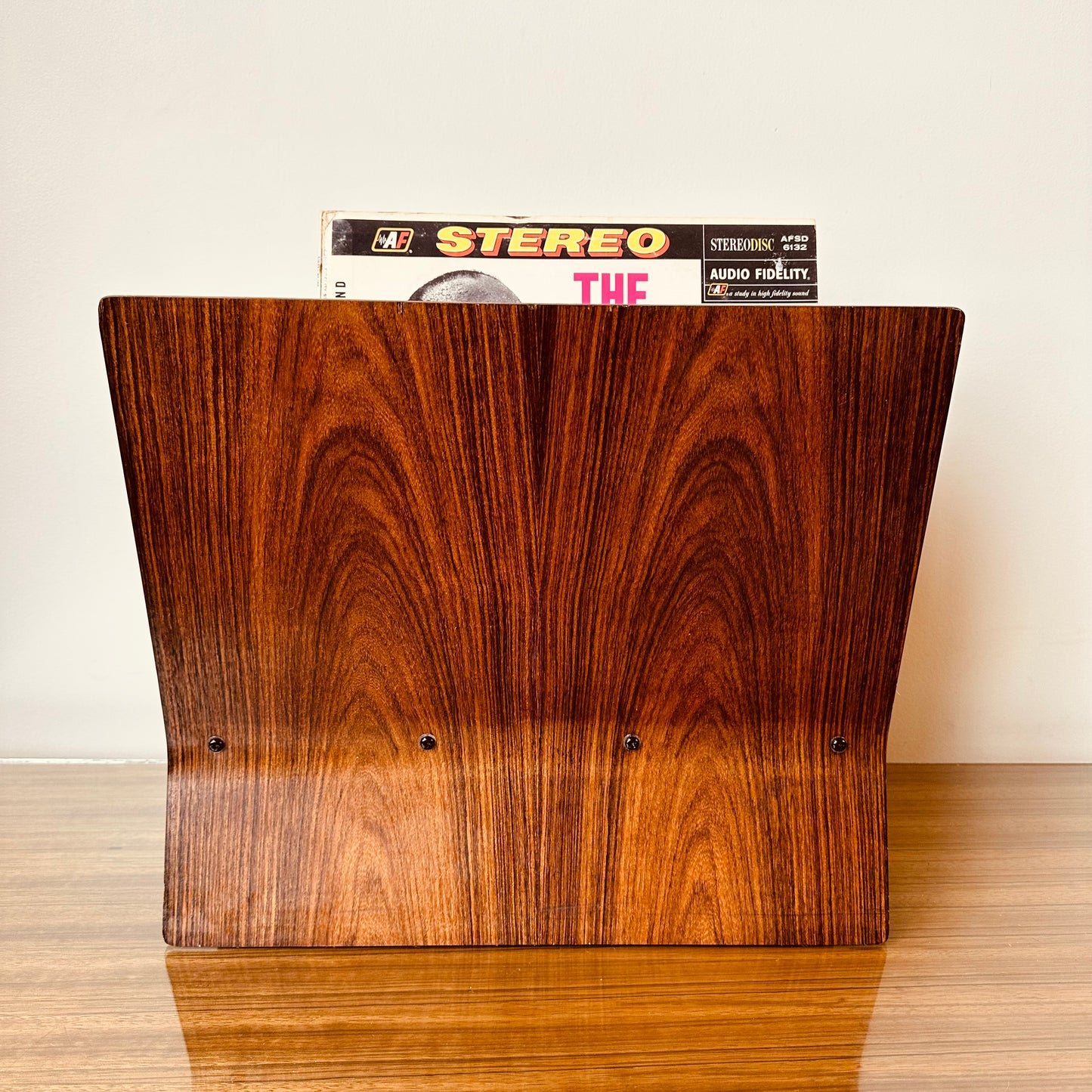 ROSEWOOD MAGAZINE RACK IN THE MANNER OF ALVAR AALTO