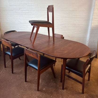 MID-CENTURY WALNUT OVAL DINING TABLE
