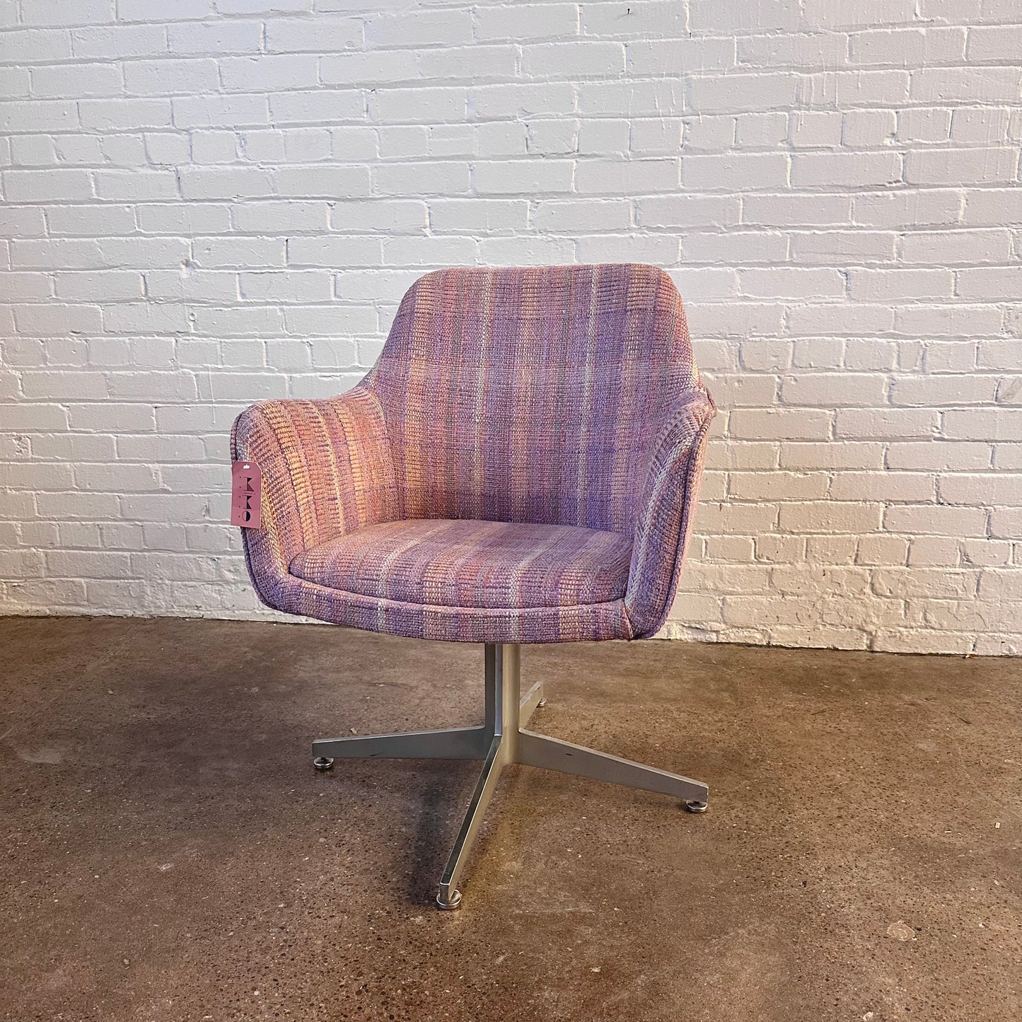 MCM PINK PLAID UPHOLSTERED SWIVEL CHAIR