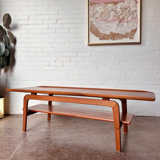 RESTORED DANISH TEAK COFFEE TABLE WITH SCULPTED LEGS