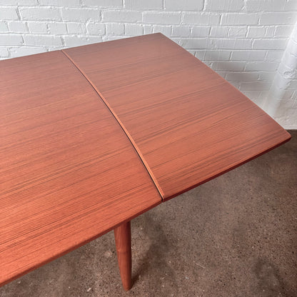 DANISH TEAK BOAT SHAPED DINING TABLE WITH DRAW LEAF