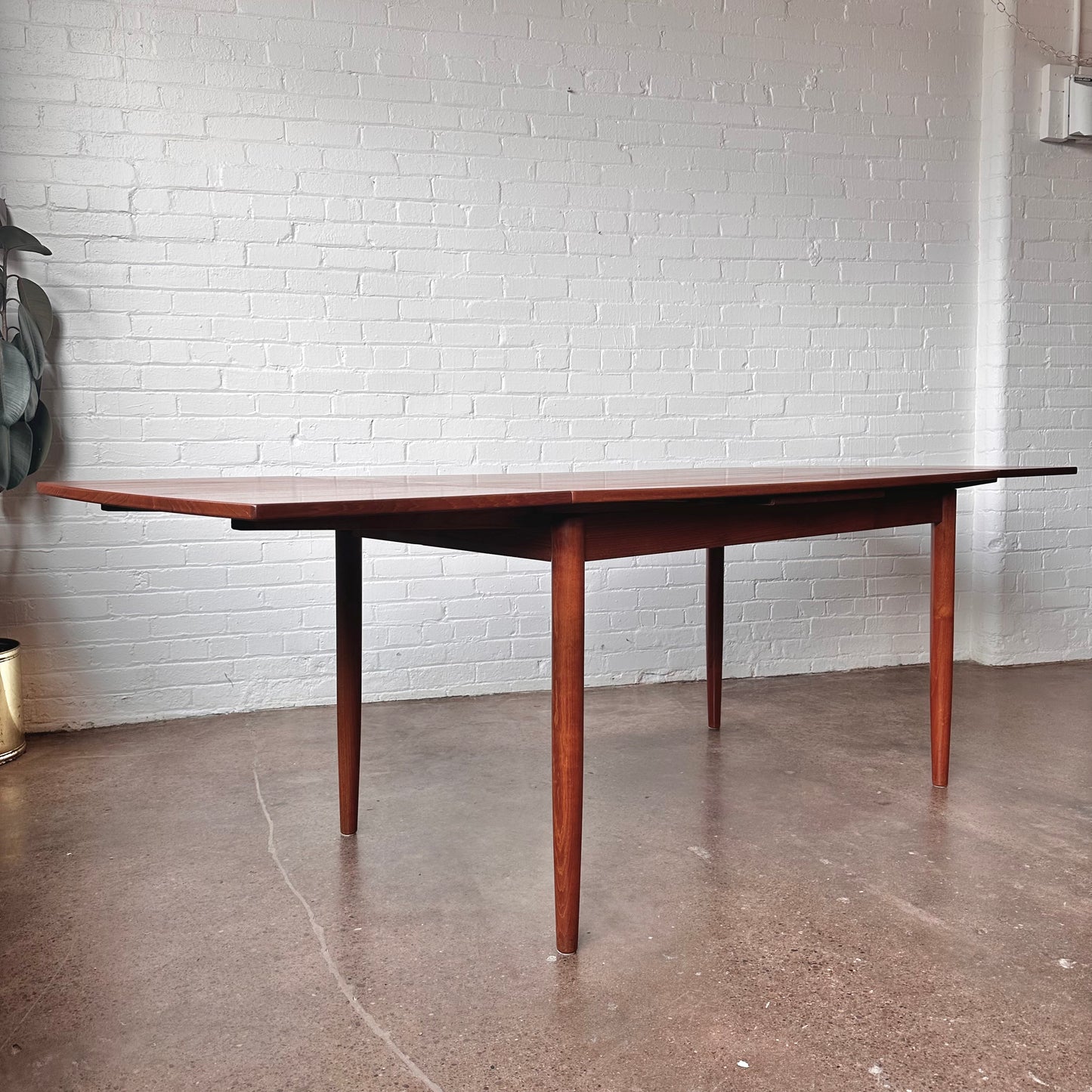 DANISH TEAK BOAT SHAPED DINING TABLE WITH DRAW LEAF
