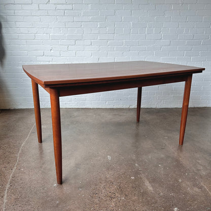 DANISH TEAK BOAT SHAPED DINING TABLE WITH DRAW LEAF