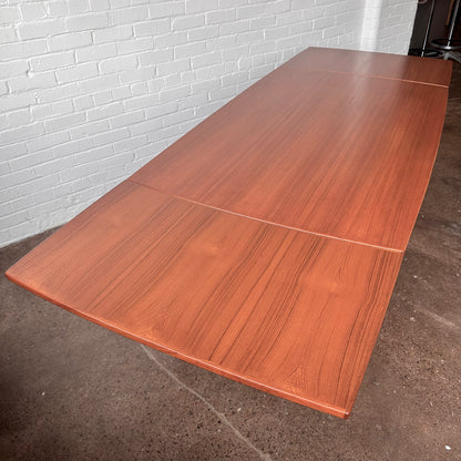 DANISH TEAK BOAT SHAPED DINING TABLE WITH DRAW LEAF