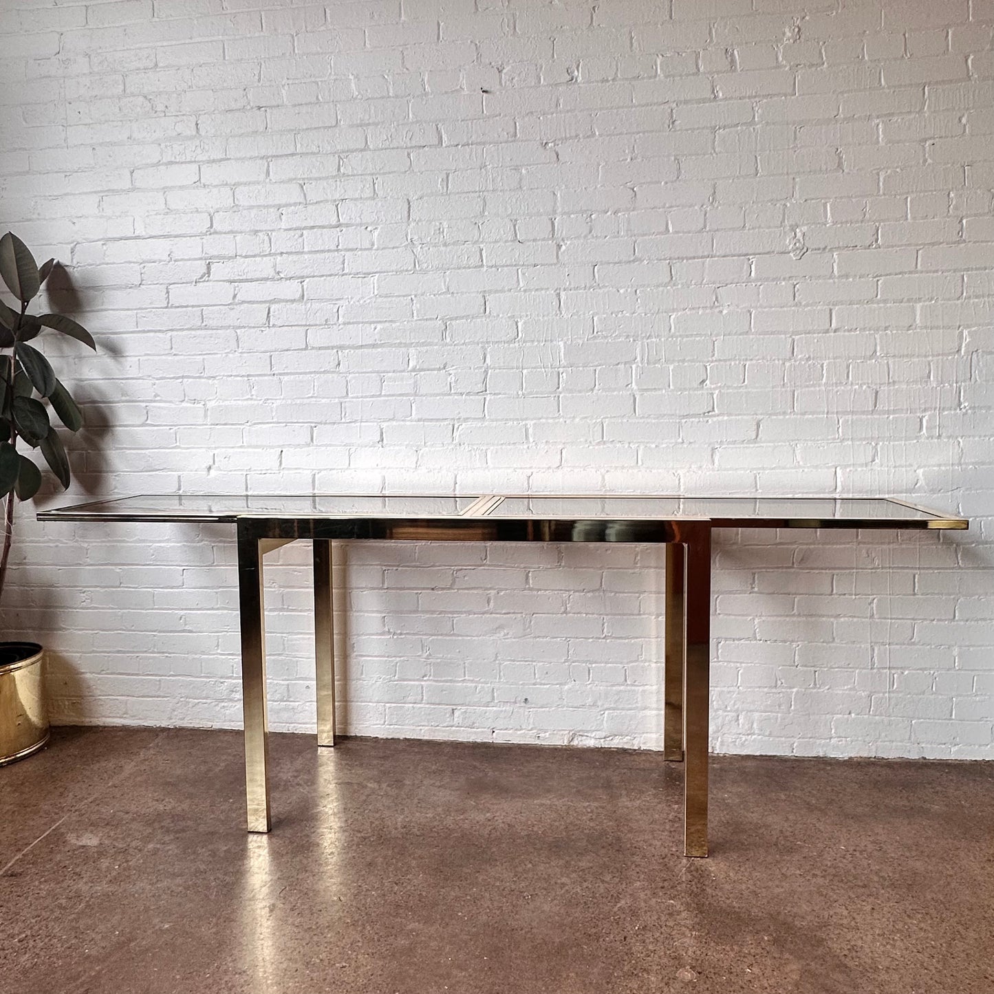 EXPANDABLE BRASS CONSOLE TABLE BY DESIGN INSTITUTE OF AMERICA