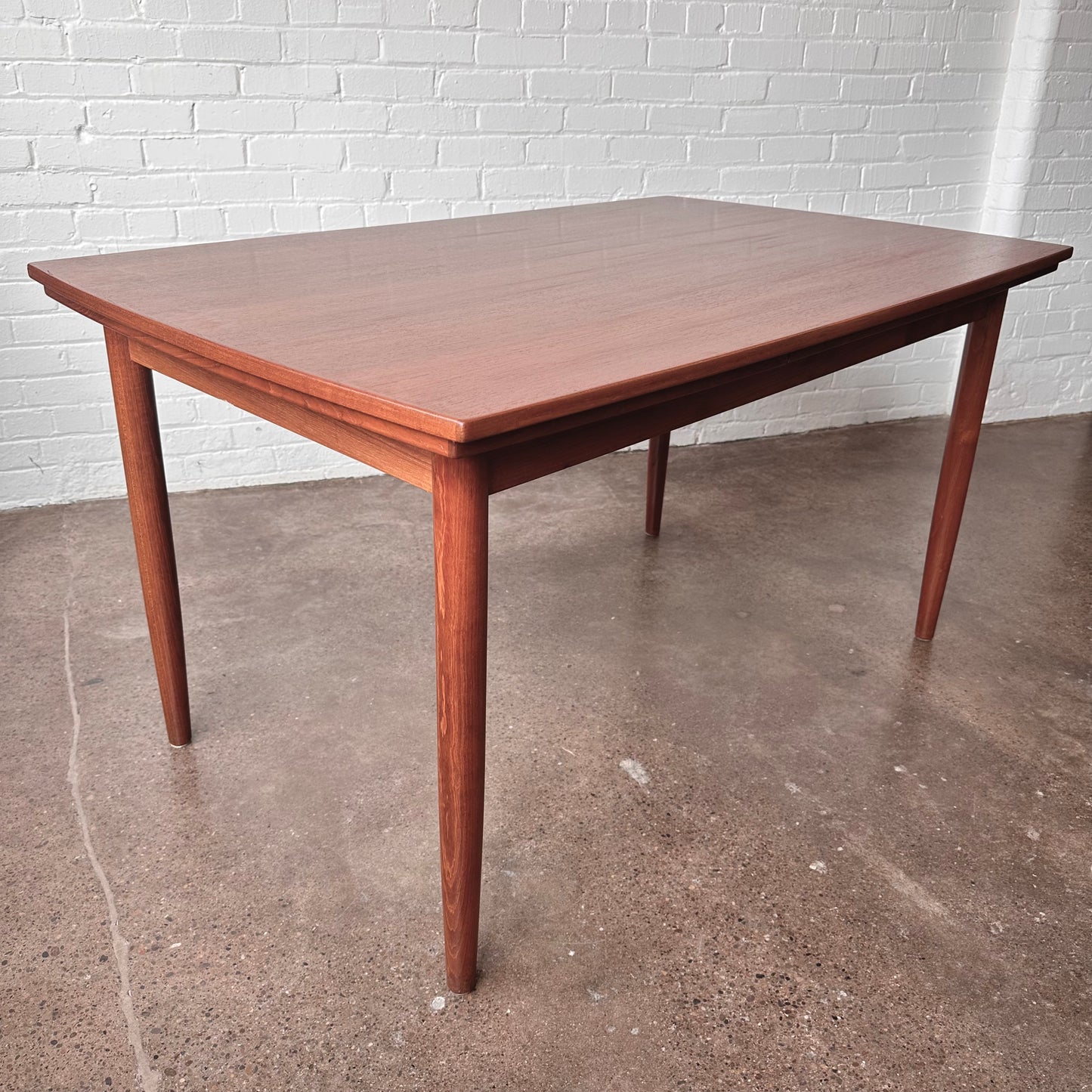 DANISH TEAK BOAT SHAPED DINING TABLE WITH DRAW LEAF