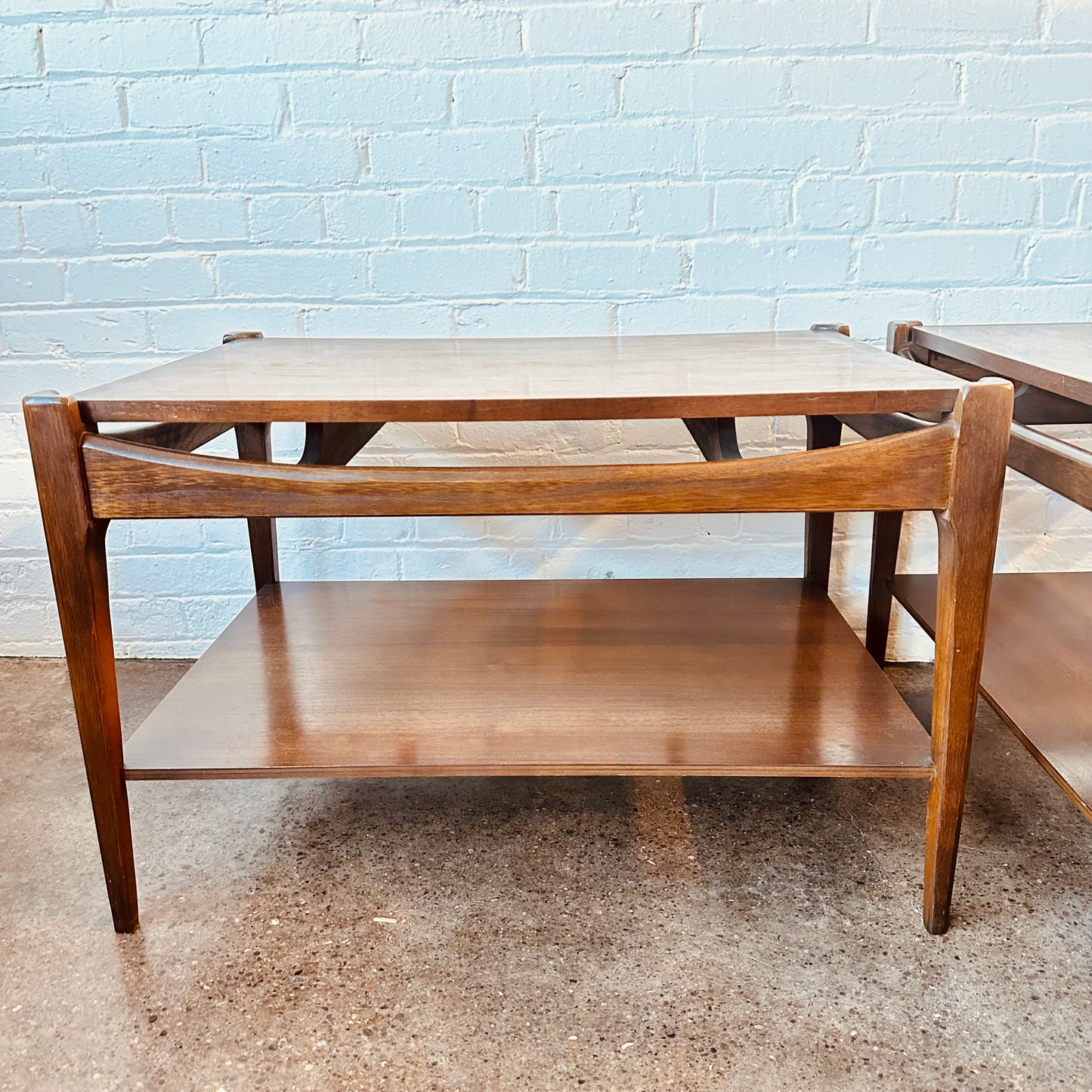MID-CENTURY WALNUT TWO-TIER END TABLES - A PAIR