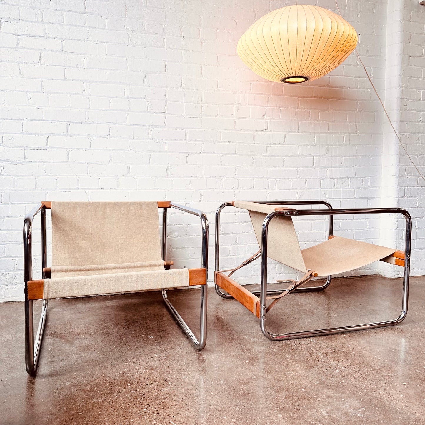 PAIR OF CHROME SLING CHAIRS BY MICHEL DALLAIRE FOR KAREMA