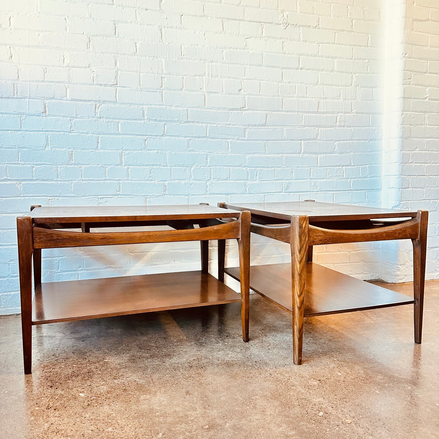MID-CENTURY WALNUT TWO-TIER END TABLES - A PAIR