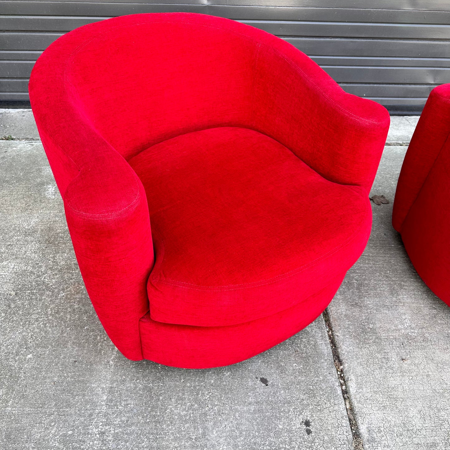 VLADIMIR KAGAN STYLE LIPSTICK RED SWIVEL AND ROCK ACCENT CHAIRS FROM DIRECTIONAL - A PAIR