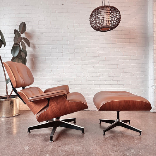 50TH ANNIVERSARY EAMES FOR HERMAN MILLER LOUNGE CHAIR AND OTTOMAN