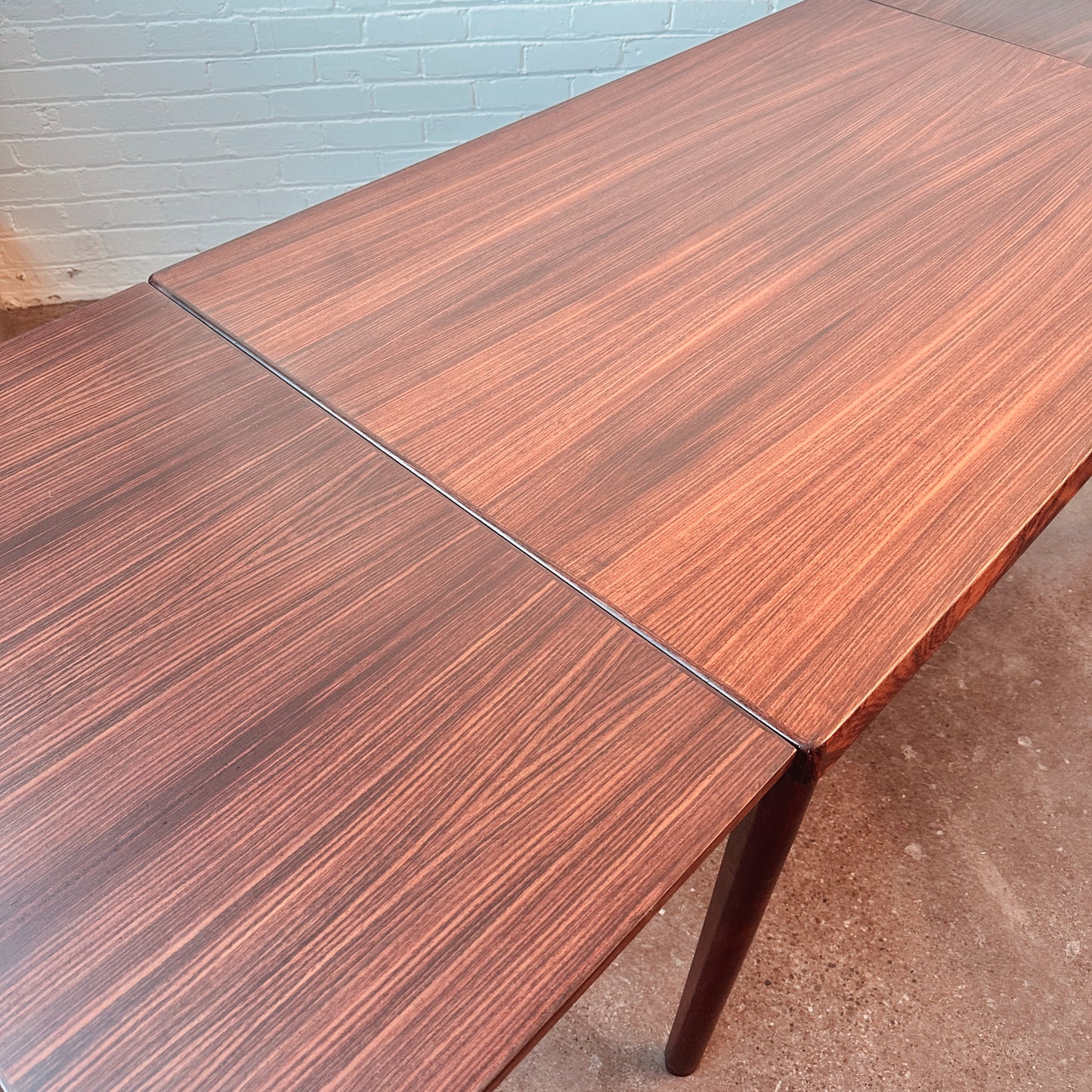 VEJLE STOLE ROSEWOOD DINING TABLE WITH EXTENSIONS