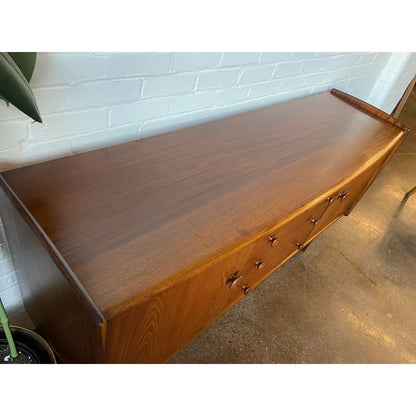 A YOUNGER CREDENZA IN AFROMOSIA & TEAK BY JOHN HUBERT