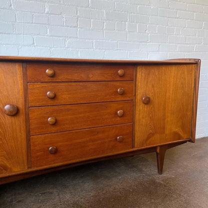 A YOUNGER CREDENZA IN AFROMOSIA & TEAK BY JOHN HUBERT